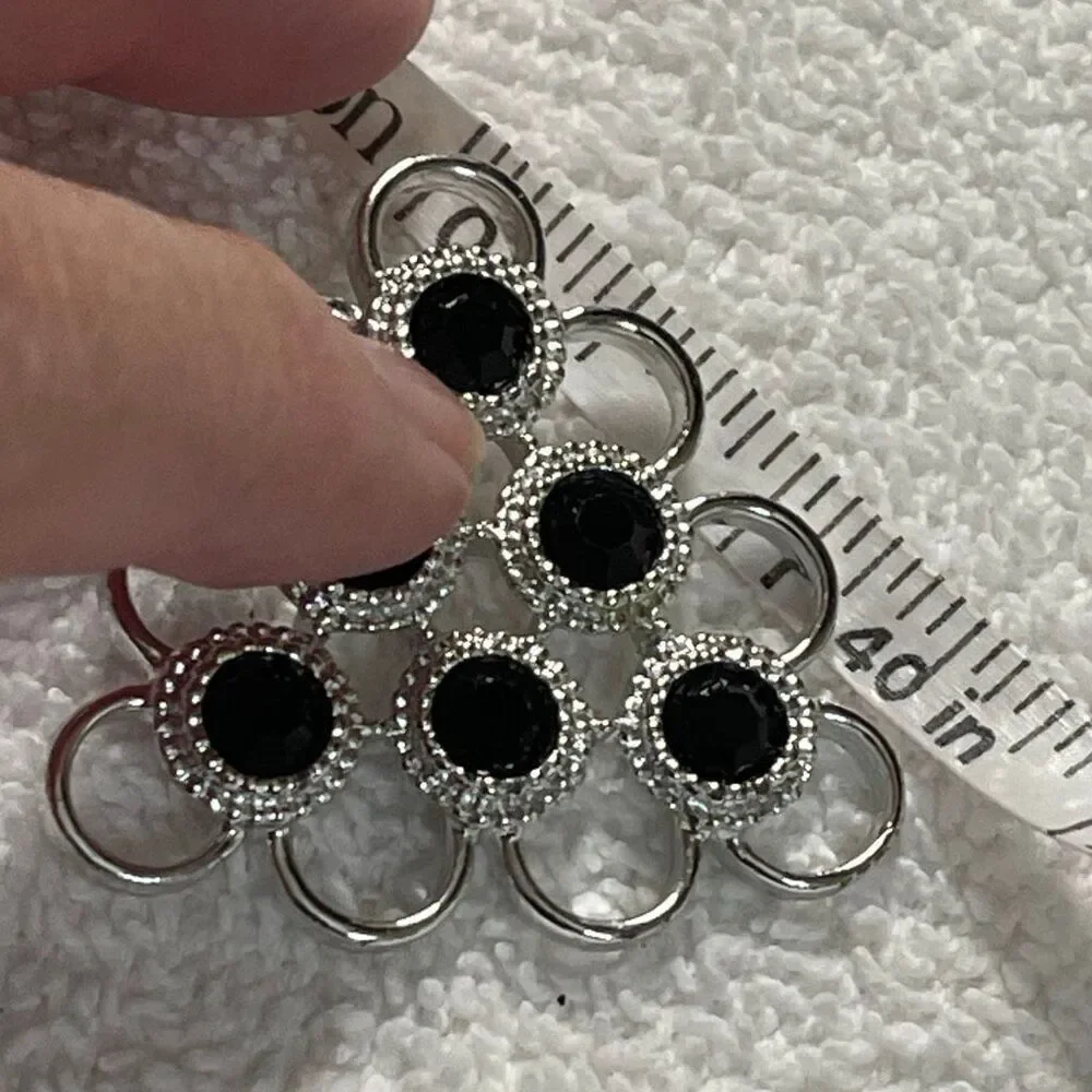 Vintage Sarah Coventry triangle open design black glass brooch